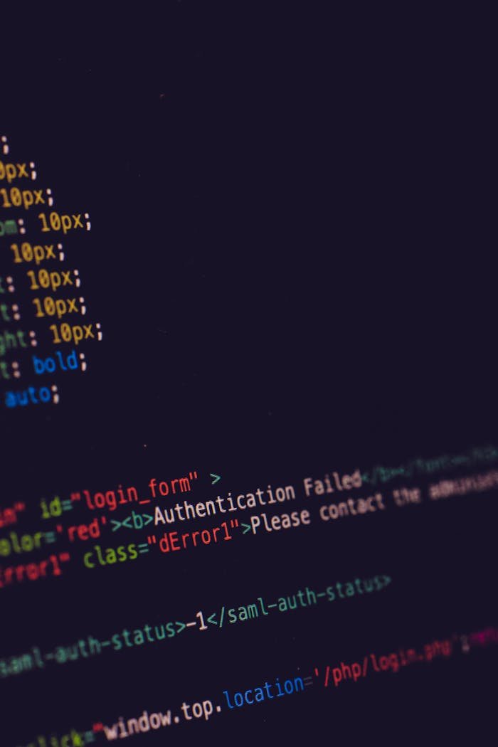 about-us-02 Close-up of programming code on a dark screen, highlighting software development concepts.